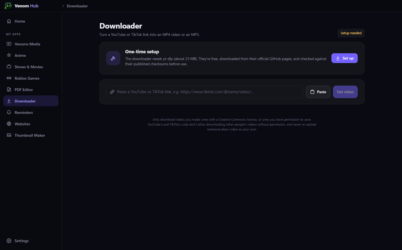 Downloader: one-time setup card and a box to paste a YouTube or TikTok link
